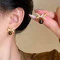 Brown Cabochon Bow Stud Earrings with Crystal Accents view 2