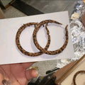 Brown Patterned Fabric Hoop Earrings With Round Silhouette view 6