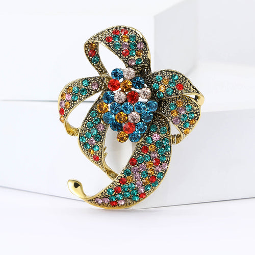 Angled view showing the looped bow brooch surface