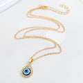Gold Tone Crystal Teardrop Evil Eye Pendant Necklace with Fine Chain view 4