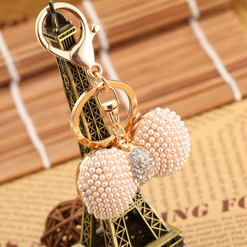 Pearl Bow Keychain with Crystal Center and Gold Tone Hardware