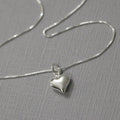 Silver Puffed Heart Pendant Necklace and Hoop Earrings view 4