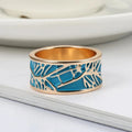 Gold Tone Turquoise Enamel Wide Band Ring In A Polished Decorative Design view 3