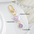 Iridescent Heart Bead Keychain With Purple Enamel Letter Charm view 2