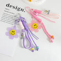 Woven Paracord Flower Keychain with Acrylic Smiley Charm view 4