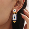 Blue White Enamel Evil Eye Drop Earrings Gold Steel view 1