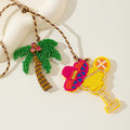 Beaded Cocktail Glass And Palm Tree Pendant On Braided Cord view 4