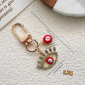 Gold Tone Rhinestone Lash Evil Eye Clip Charms in Five Colors view 4