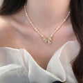 Pink Pearl Strand Necklace With Crystal Bow Pendant view 3