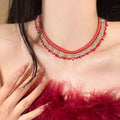 Layered Red Beaded Necklace With Blue And Gold Tone Fringe view 1