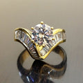 Round Clear Solitaire V-Shaped Baguette Ring Gold Tone view 1