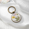 Antique Bronze Round Pressed Flower Split-Ring Keychains in Three Designs view 5