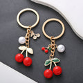 Six-Style Red and Black Cherry Pearl Charm Keychain Collection view 2