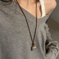 Brown Cord Stone Bag Charm Pendant Necklace Gold Hardware view 4