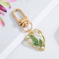 Gold Tone Pressed Flower Resin Clip Keychains in Four Shapes view 8
