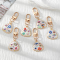 Gold Tone Evil Eye Printed Shell-Look Lobster-Clasp Charms in Six Designs view 1