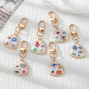 Gold Tone Evil Eye Printed Shell-Look Lobster-Clasp Charms in Six Designs