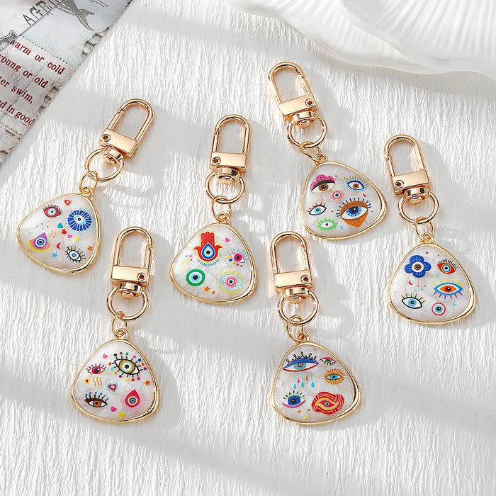 Gold Tone Evil Eye Printed Shell-Look Lobster-Clasp Charms in Six Designs