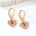 Gold Tone Crystal Heart, Lightning, Eye and Hamsa Huggie Earrings view 2