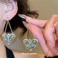 Green Crystal Butterfly Drop Earrings with Floral Bead Clusters view 2
