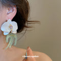 White Orchid Drop Earrings with Green Swallow Shaped Dangles view 3