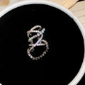 Crisscross Crystal Ear Clips in Silver and Gold Tones view 6