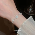 Enamel Flower Bracelet and Butterfly Pearl Stud Earrings view 4