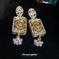 Gold Tone Crystal Rectangle Drop Earrings With Polished Metal Details view 4