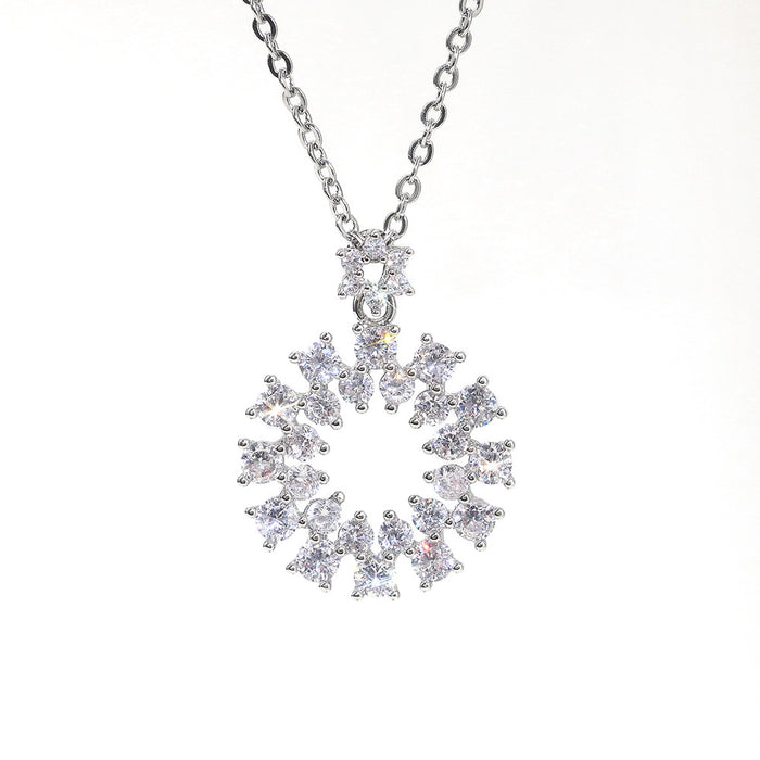 Silver Tone Open Floral Wreath Pendant Necklace With Polished Clear Stone Detail
