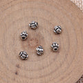 Tiny Flower Spacer Beads in Three Antique Metal Finishes view 2