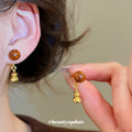 Brown Bead Gourd Drop Stud Earrings With Gold Tone Charms view 1