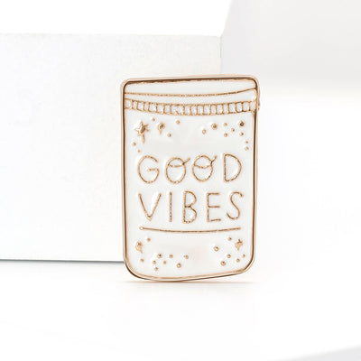 Good Vibes Can brooch shown from the front