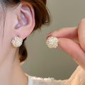 White Floral Cluster Stud Earrings With Gold Accents view 2
