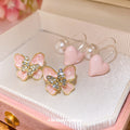 Pink Butterfly Studs and Heart Pearl Drop Earrings view 1
