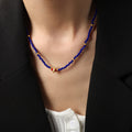 Blue Faceted Bead Necklace Gold Crystal Ring Red Accents view 4