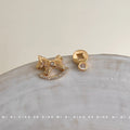 Gold Tone Rocking Horse And Clear Stone Asymmetric Stud Earrings view 4
