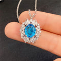 Silver Tone Ocean Blue Oval Halo Crystal Pendant Necklace view 4