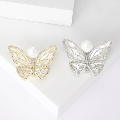 Gold and silver mother of pearl butterfly brooches