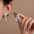 Mismatched Color Paint Palette and Brush Stud Earrings view 1