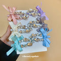 Crystal Bow Duckbill Hair Clip In Pink Or White With Teardrop Fringe view 3