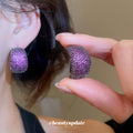 Purple Crystal Wide Huggie Earrings with Dark Metal Trim view 2