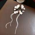 Sculpted Metal Petal and Wavy Stem Long Drop Earrings view 7