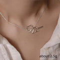 Interlocking Double Heart Pendant Necklace In Gold And Silver Tones view 4