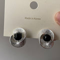 Silver Tone Textured Disc Stud Earrings With Black Centers view 6