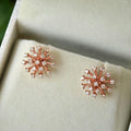 Rose Gold Tone Starburst Crystal Stud Earrings with Polished Finish view 4