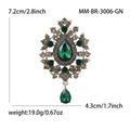 Teardrop Glass Brooch With Ornate Antique Tone Crystal Frame view 9
