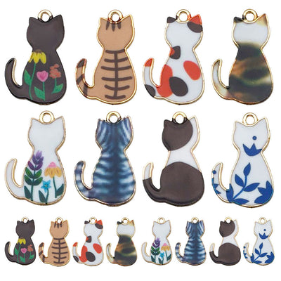 Colorful cat charms arranged on a light background