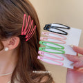 Glossy Enamel Openwork Oval Snap Hair Clips 4-Pack Black view 1