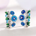 Silver Tone Blue Flower Green Leaf Huggie Earrings view 4