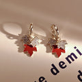 Red Maple Leaf Crystal Look Gold Tone Huggie Earrings view 6